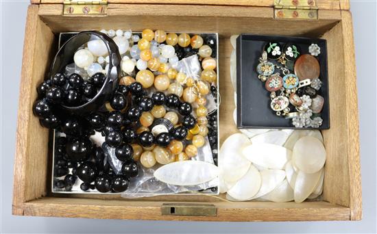 A box containing: micro mosaic earrings and bracelet, various intaglios, mother-of-pearl counters and necklaces etc
